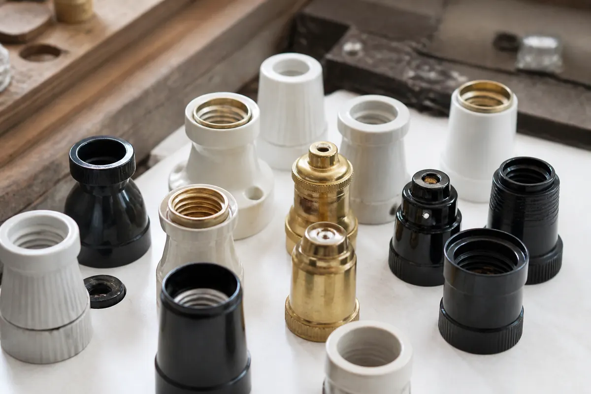Lamp holders and electrical fittings on a workbench